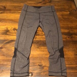 Lululemon, mid rise, grey and black capris. Size 6